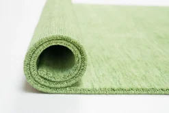 Theo Keller Handwebteppich grün